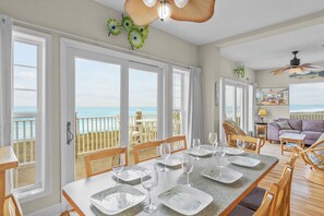 Oceanview dining table with seating for up to 8 people makes every meal taste that much better.