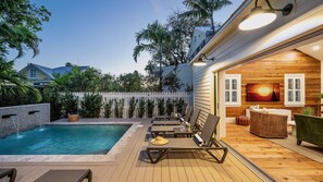 Open the back door and lounge by the pool...