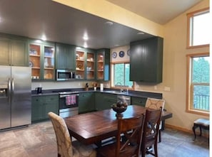 Dining and custom-built kitchen