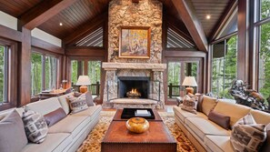 High ceilings, gas fireplace, ample seating and stunning views from the Great Room