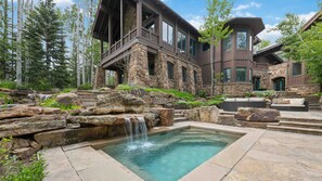 Paragon's expansive in ground hot tub and summertime plunge pool