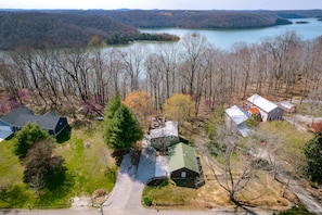 Aerial view of property showing 70ft boat parking + driveway.