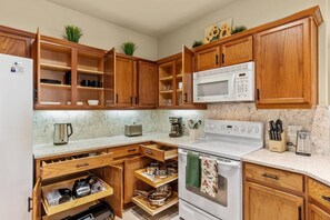 Equipped Kitchen with major and small appliances, dishes, utensils, etc. 