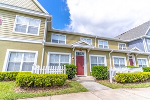 Open Parking in Front of Town Home Building