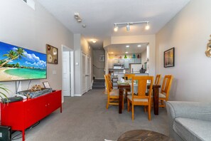 Sectional Sofa and Large Flat Screen TV in Living Area