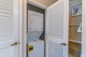 Laundry Area w/Stacked Washer and Dryer For Your Convenience