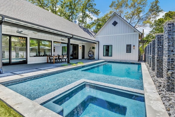 Escape the Texas heat in your private courtyard oasis.