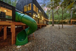 Fun slide starts on deck and winds down off the deck
