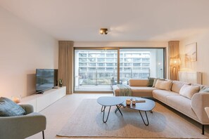 Inviting and elegant living area with direct access to terrace