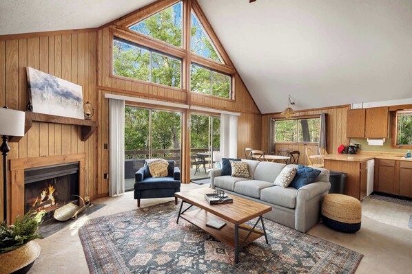 Enjoy spending time in the large living/dining room with amazing views.  Perfect for stargazing and watching the snow fall.