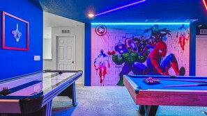 Marvelous Game Room with Air Hockey, Pool Table, Foosball, and Mortal Combat Arcade Game