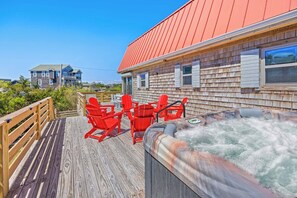 It may be the home’s amazing sun decks that will draw you in to relax in the 6-person hot tub, sink into an Adirondack chair with a good book, or soak in those vitamin D rays.