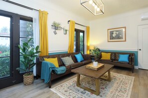 Two large window create a warm, inviting atmosphere.