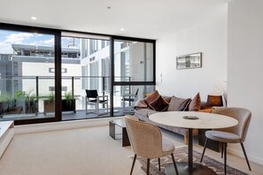 The open-plan living space includes the kitchen, lounge and dining area.