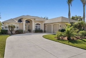 Modern design with a three car garage