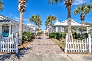 Drive to the left of the main house down your own driveway to the carriage house