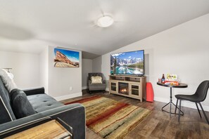 Bedroom 4 | Media Loft with Queen Sleeper Sofa and Flatscreen TV (third level)