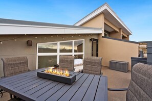 Rooftop Deck | Outdoor Dining, Lounge Furniture and Outdoor Fireplace (third level)