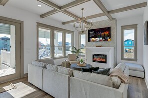 Escape into your favorite shows on the large TV, nestled within the comfort of our stylish sectional sofa