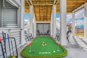 Illuminate your evenings with fun and laughter as you play glow-in-the-dark putt putt golf