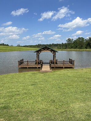 Pavilion just steps from the cabin. Perfect for fishing or getting a tan.