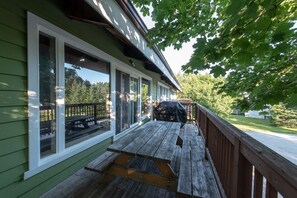 Oversize balcony for outdoor barbecuing and dining with view of Blue Mountain