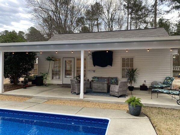 Outdoor space with covered porch