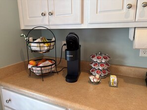 Keurig, coffee pods, creamer and sugar provided