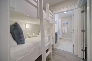 A charming space with built-in bunk beds for a snug sleep.