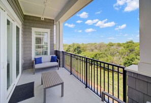 A spacious balcony providing scenic views and a place to unwind in the fresh air.