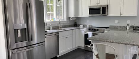 Open concept kitchen fully equipped
