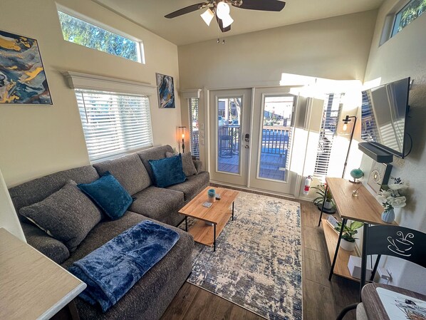 Stylish living room, Sectional Sofa, Smart TV, High Ceilings, French Doors 