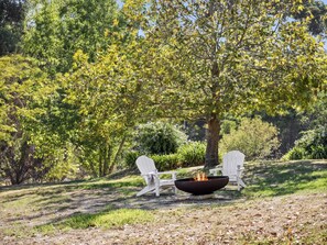 Gather under a starlit sky around the fire pit, perfect for toasting marshmallows, sharing stories, or simply soaking in the stillness.