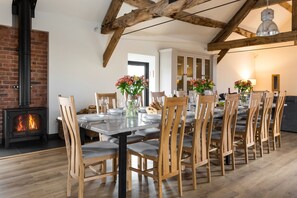 Relax by the wood burning stove in the beautiful dining area