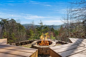 Outdoor firepit includes amazing views.