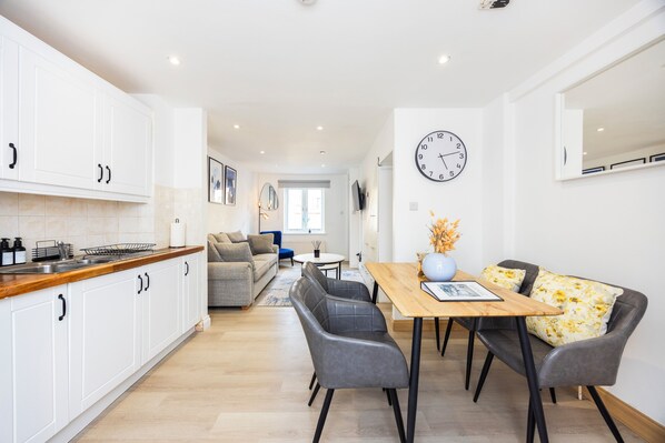 Open plan living room and Fully equipped kitchen