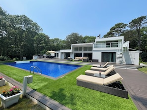 Relax by the Pool with 4-sun padded water-resistant  lounge chairs