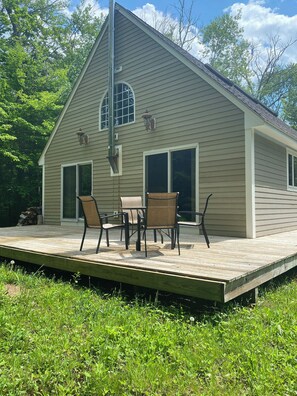 Back deck with grill n extra chairs