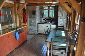 The kitchen easily seats 6.  That's the 4-oven Aga stove under the windows.