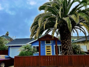 Front view of house. Attached garage. 