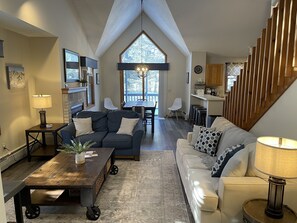 Living room with comfy couch and love seat