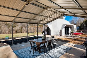 Outside covered dining area + Hammock