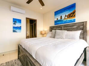 This condo also offers a second master bedroom, providing additional comfort and privacy. Featuring a cozy king-sized bed, ample closet space, and elegant decor, this room is perfect for guests or family members. With its own en-suite bathroom and plenty of natural light, the second master 