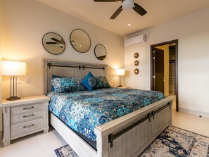 Master bedroom with a king-sized bed and private ensuite for ultimate comfort and privacy.
