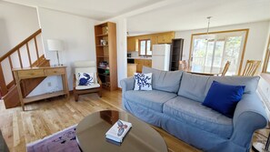 Living room opens to dining area