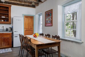 Experience the warmth of Southern hospitality in the dining area, a welcoming space for family and friends to come together.