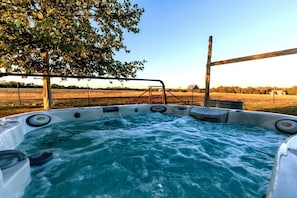 Spacious hot tub with pasture views