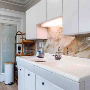 Kitchen sink with tile backsplash
