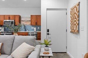 Walk into the first floor with Living Room and Kitchen.