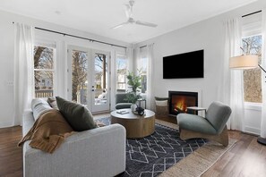 Warm Living Room with Fireplace and Comfortable Sofas